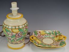 Three pieces of Charlotte Rhead for Crown Ducal comprising a tubelined table lamp, H35cm and pair of
