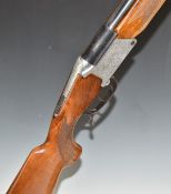 Nickerson 12 bore folding over and under shotgun with engraved scenes of dogs to the locks,