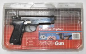 Daisy Model 09 6mm Beretta style airsoft pistol with monogrammed and chequered composite grips,