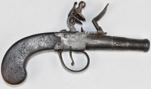 Indistinctly named flintlock pocket pistol with shaped wooden grips and 1.5 inch smooth bored turn