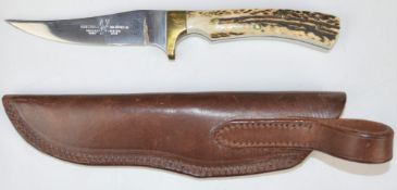 A bespoke hand-made sheath knife with deer horn handle by Stuart Mitchell, impressed 'Monarch