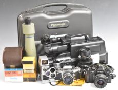 Collectable cameras comprising Panasonic M10 video camera, Exakta VX1000 SLR with Zeiss 2/50 and