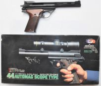 Auto Mag Scope Type .44 AMP Model 180 replica pistol, in original box with scope, accessories and