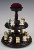 Royal Crown Derby Imari thimble collection on stand, with book including well known patterns /