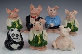 Wade Nat West pig money boxes and a WWF panda example, tallest 18cm