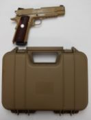 Colt Government .45 automatic Rail Gun style .177 airsoft pistol with faux wooden grips, serial