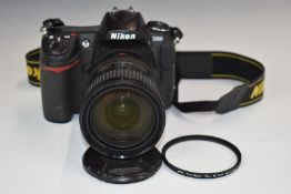 Nikon D300 digital SLR camera fitted with AF-S Nikkor 18-200mm 1:3.5-5.6 G ED DX lens