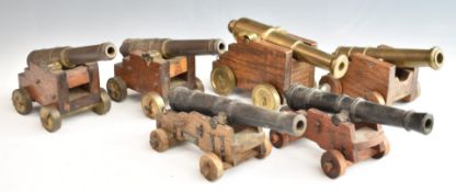 Six model cannon with brass/bronze and iron barrels, to include one marked Akers 1780 to carriage,