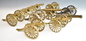 Ten mainly brass model cannon including a pair, length of longest 23cm