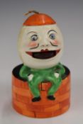 Art Deco mechanical Humpty Dumpty stamp licker, probably Carlton Ware, H13cm
