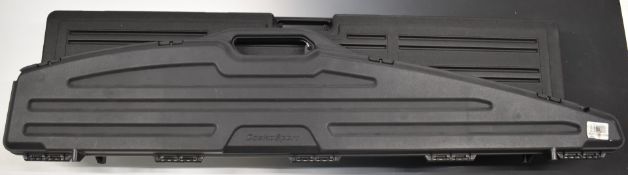 Two Doskosport and similar hard shotgun and rifle flight carry cases, length 140cm and 120cm.