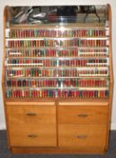 Three-hundred-and-twelve paper cased collector's shotgun cartridges in a purpose built mirror backed