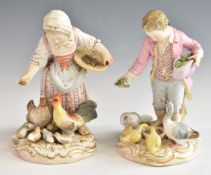 Pair of Meissen figures of children feeding fowl, H12cm
