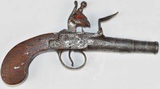 Queen Anne flintlock pistol with shaped wooden grips and 2.25 inch smooth bored turn-off barrel,
