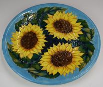 Moorcroft large charger decorated in the Sunflowers pattern, in box, diameter 35.5cm