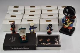 Two limited edition sets of Carlton Golly figures, largest Golly 108/250 figure, badge collection