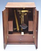 John Davis Derby 19thC brass microscope in mahogany case with two cases of slides and accessories