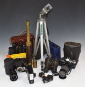 Cameras and binoculars comprising Canon AT-1 with 80-1200m 1:4 and 35-70mm 1:35 -4.5 lenses, Omega 7