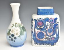 Two Copenhagen vases comprising a Faience example and another decorated with blackberries