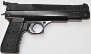 Webley Nemesis .177 air pistol with gold inset logo to the chequered grips and adjustable trigger