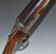 Victor Sarasquetta 12 bore side by side ejector shotgun with named and engraved locks, engraved