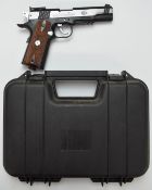Colt Special Combat .177 air pistol with faux wooden grips, serial number 13H39737, in hard carry