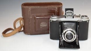 Ross Ensign Selfix 12-20 folding camera fitted with Xpres 75mm f3.5 lens, in original leather case