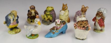 Nine Beswick Beatrix Potter figures to include Johnny Town Mouse With Bag and Chippy Hackee, tallest