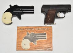 Two pistols comprising the Winlee Derringer .22 starting pistol with chequered faux ivory grips in
