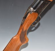 Baikal NK-27E 12 bore over and under ejector shotgun with engraved scenes of birds to the locks,