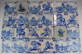 Approximately twenty three Delft blue and white tiles including mounted riders, shipping, fishing,