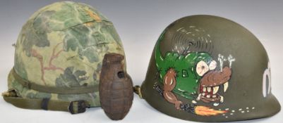 American Vietnam era M1 helmet and liner decorated with 1st Cavalry Division emblem, together with a