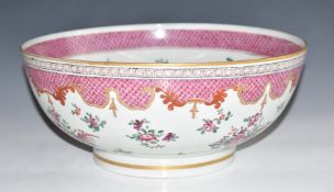 A 19thC porcelain pedestal bowl decorated with flowers, diameter 25.5cm x H12.5cm