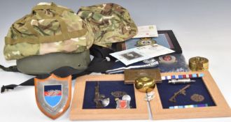 Modern combat helmet, size large, with various covers, marching compass by TG Company dated 1940,