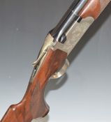 SKB 500 Sporting 12 bore over and under ejector shotgun with engraved scenes of birds to the