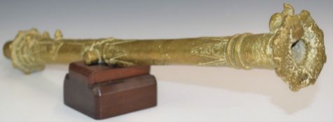 South East Asian bronze lantaka swivel cannon barrel, on wooden stand, length 65cm