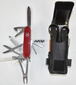Victorinox officer's Swiss Army knife with fifteen blades/tools together with pack containing