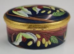 Moorcroft enamels oval hinged lidded oval casket decorated with fruit, W6.5 x D4.5 x H3cm