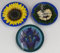 Three Dennis Chinaworks plaques with flower decoration, diameter 16cm