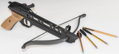Barnett Trident crossbow with shaped and chequered grips, adjustable sights and four bolts.