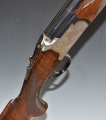 Lanber 12 bore over and under ejector shotgun with floral engraved locks, underside, trigger guard