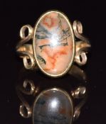 A c1900 9ct gold ring set with a moss agate cabochon, 4.6g, size N