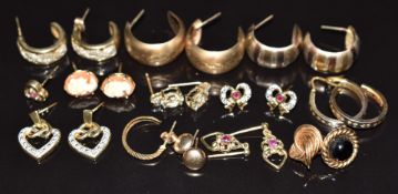Nine pairs of 9ct gold earrings including cameo, diamond, ruby and diamonds, hoops, etc and six