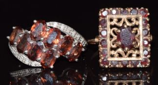 Two 9ct gold rings, one set with spinel and diamonds the other garnets, 9.6g, sizes P & S