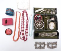 A collection of jewellery including glass beaded necklace, silver christening bangle, coral