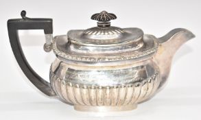 Georgian hallmarked silver teapot with reeded lower body, London 1807, maker's mark HN, length 25.