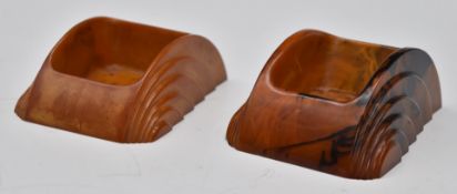 Pair of Art Deco Dickinson Cavacraft amber Bakelite desktop sponge holders, W 10.5 x D7.5 x H4.2cm