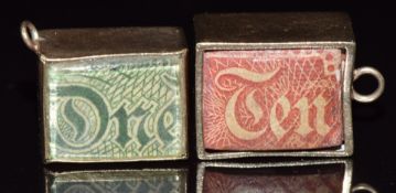 Two gold charms, one with ten shilling banknote the other with £1 banknote, 5.6g