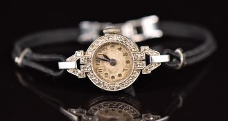 Josarn Art Deco platinum ladies wristwatch with diamond set case, blued hands, gold Arabic numerals,