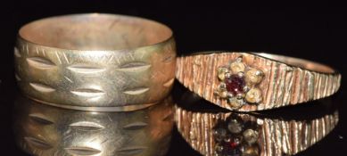 A 9ct gold ring and a 9ct gold ring set with a garnet and paste, 4.5g, size Q